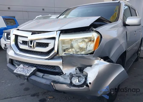 2011 Honda Pilot Touring z USA, uszkodzony, nr VIN 5FNYF3H97BB054681